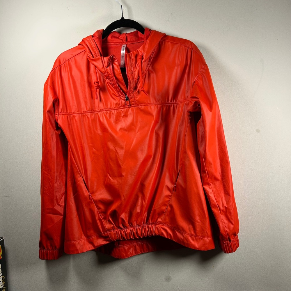 Fabletics Windbreaker Jacket Womens XS Orange Modern Half Zip Hooded Pockets